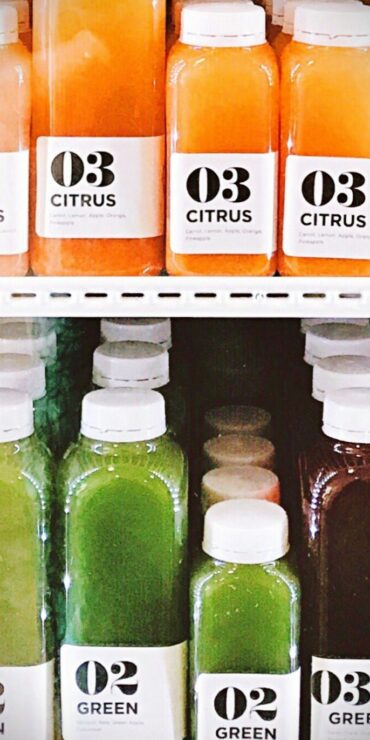 Selection of juices in a fridge.