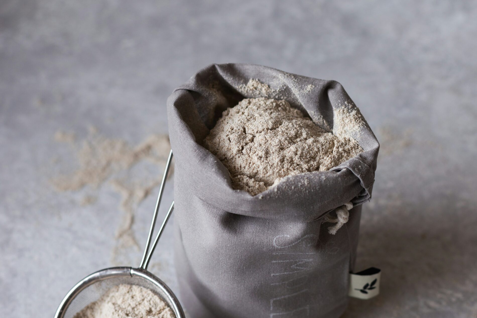 Rice Flour in a bag with a scoop