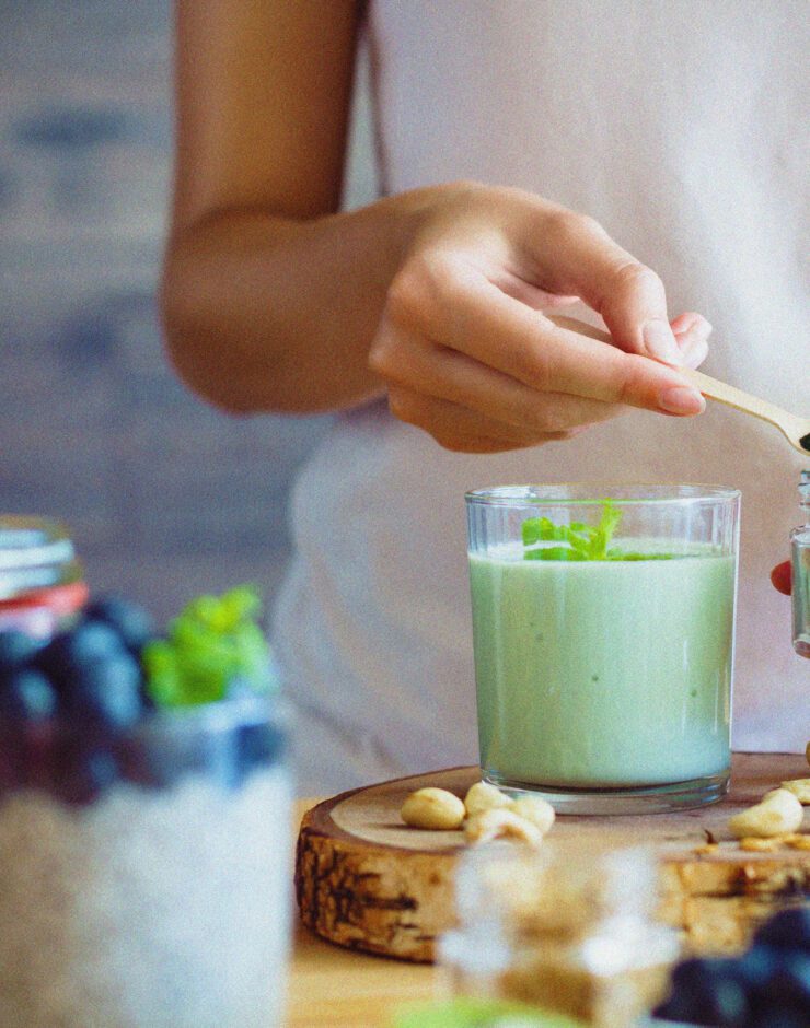 Femal making matcha.