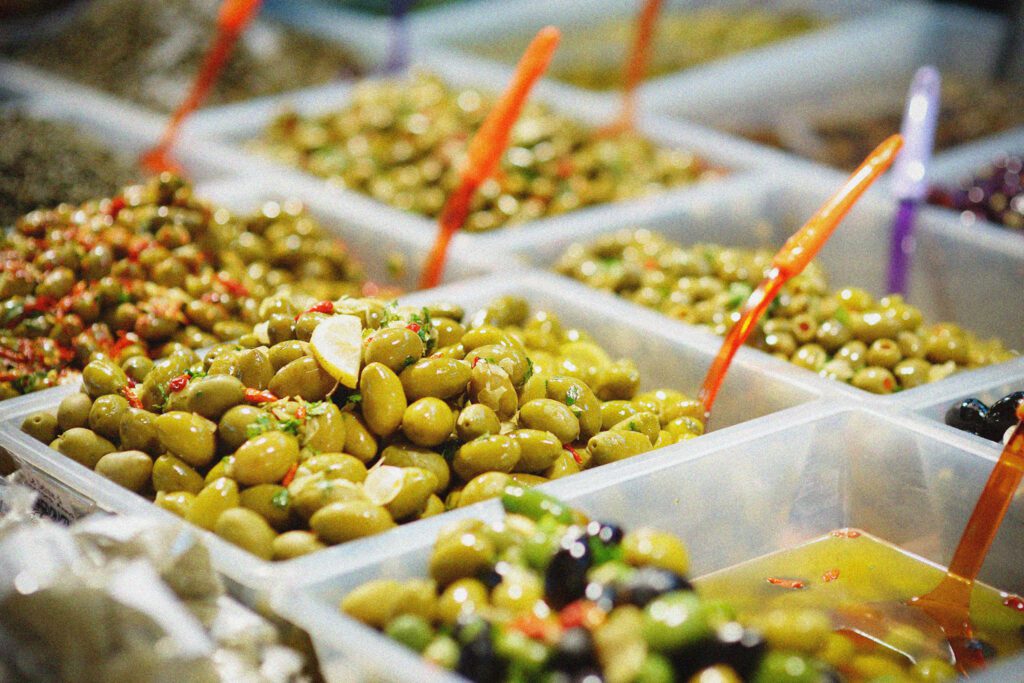 Olives in a buffet bowl.